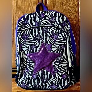 DISTINCTIVE BACKPACK with LOTS OF ROOM & LOTS OF STORAGE AREAS…